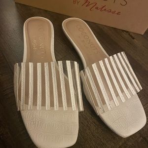 Coconuts up late white sandal